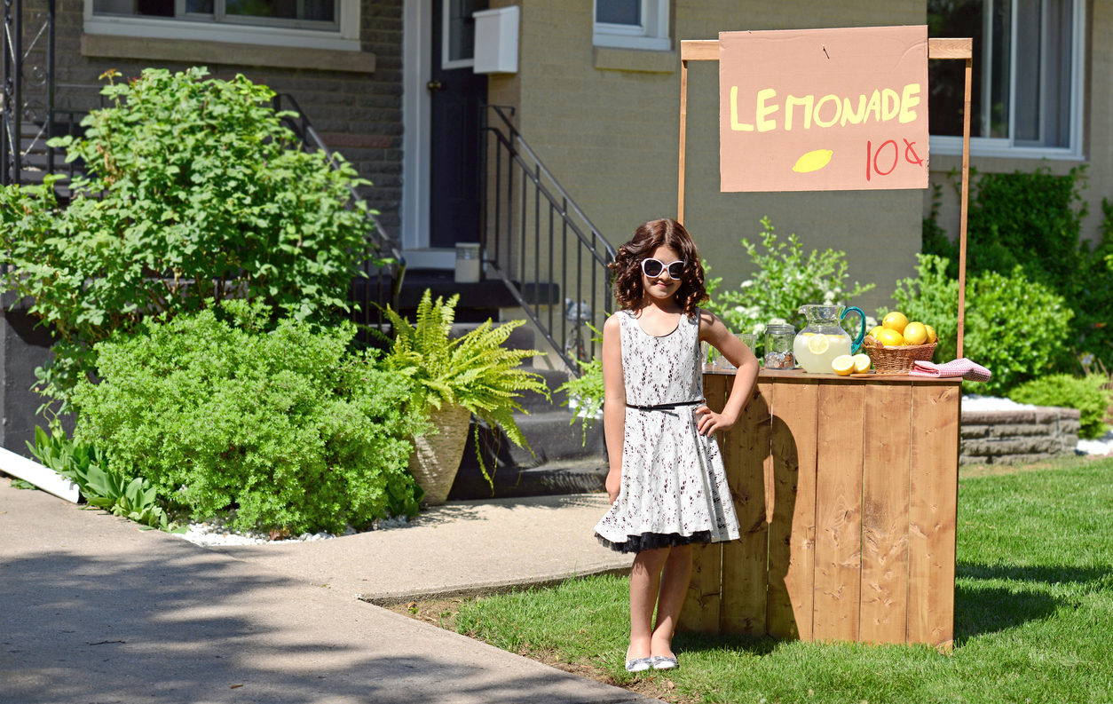 little girl with lemonade stand
