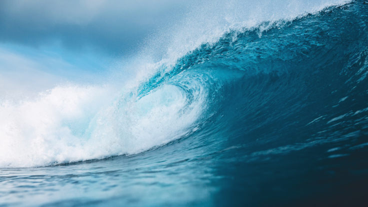 Ocean blue wave in ocean. Breaking wave for surfing in Bali